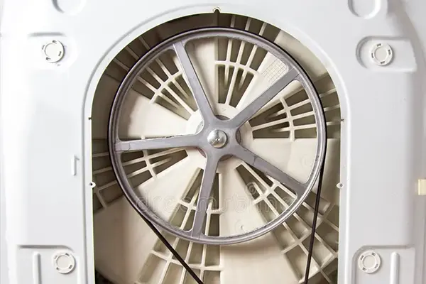 Pyykinpesukoneen hihnapyörä: Linkoussyklin sydän